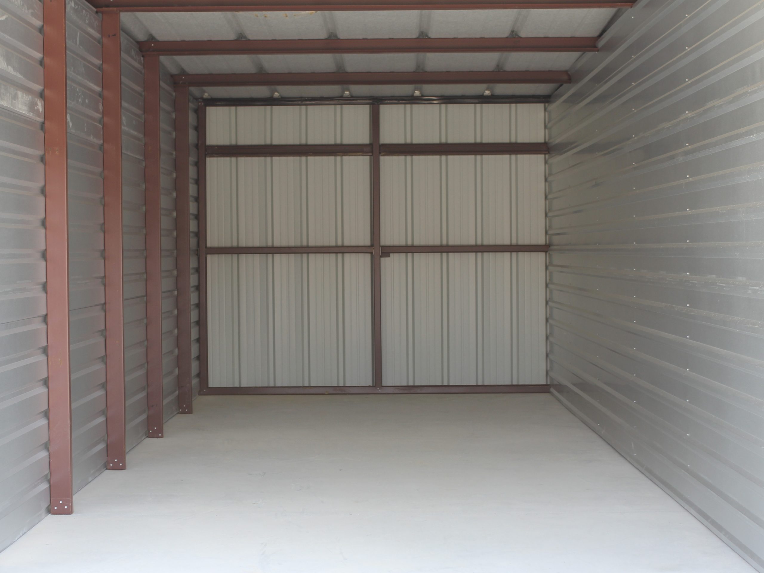 Inside storage unit of a steel building on a concrete floor at AAA Lakeside Storage in Provo, Utah